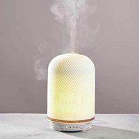 neom wellbeing pod diffusing essential oil