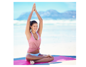 woman cross legged hands in air