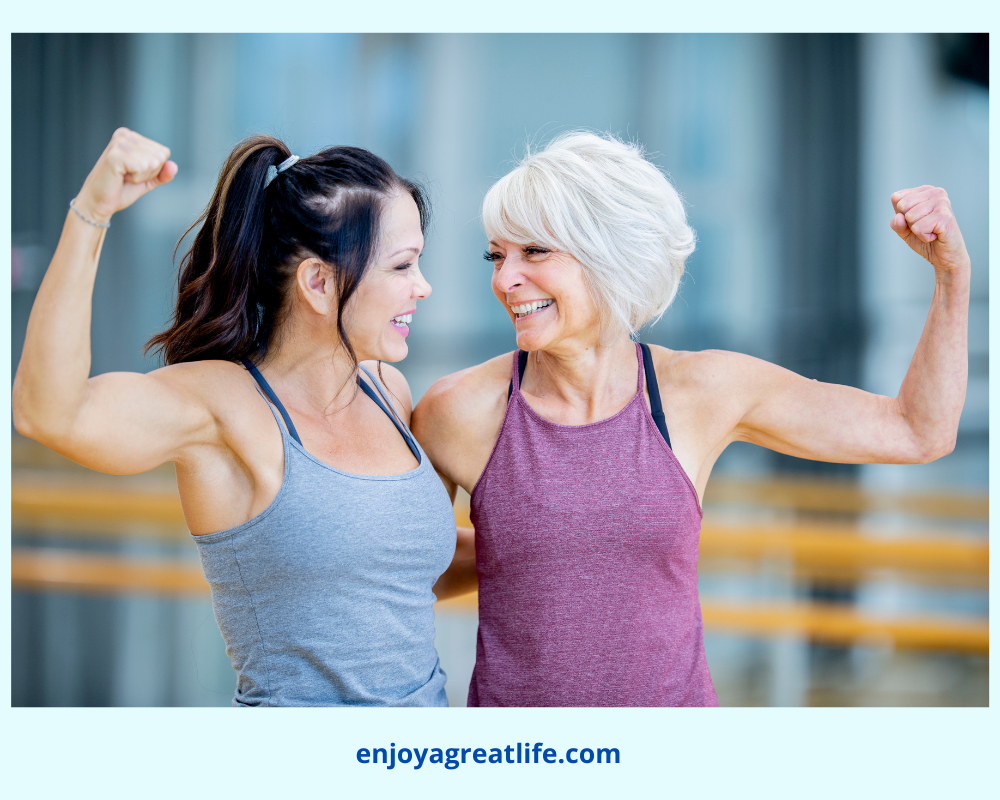 strong women flexing their arm muscles