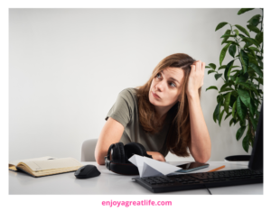 woman staring into space procrastinating