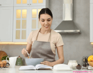 woman with recipe book following a recipe